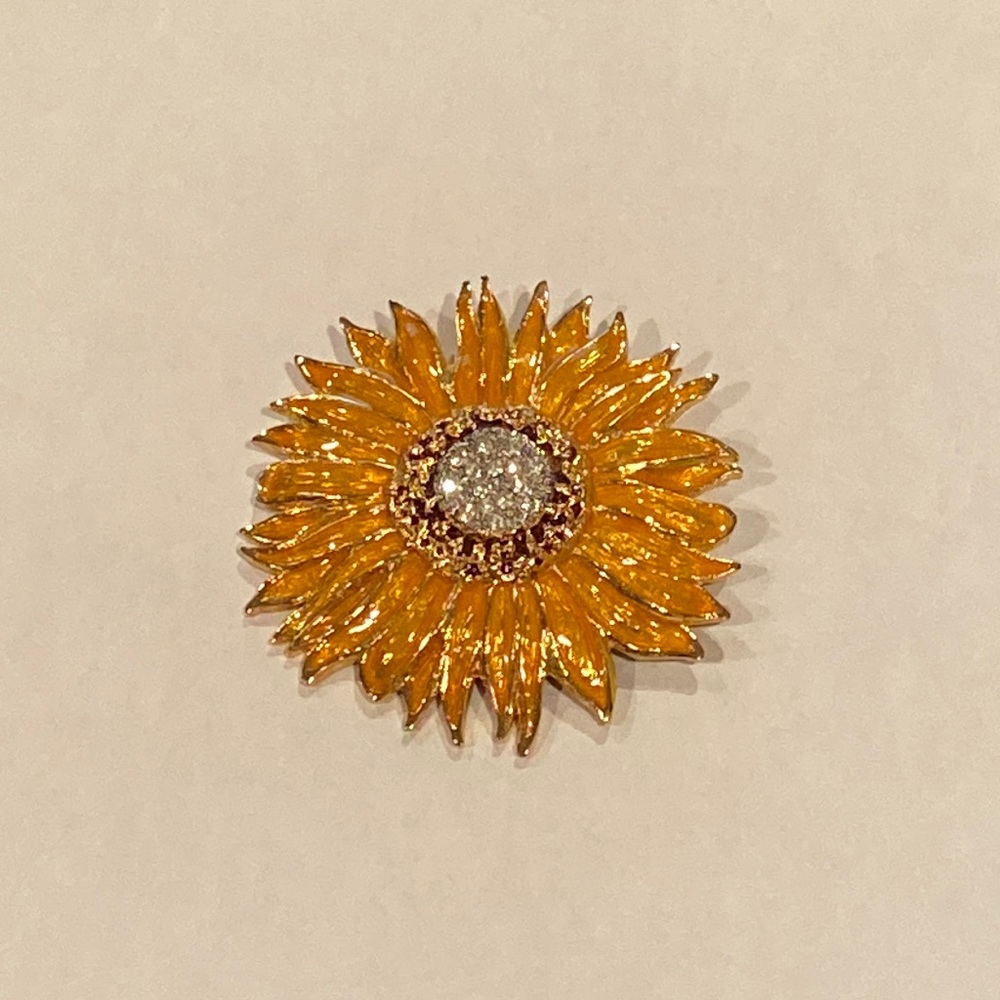 Beautiful enamel sunflower brooch with rhinestone center by Angel 1989-1999.